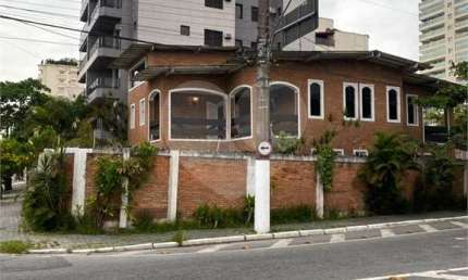 Sobrado com 4 quartos à venda ou para locação em Enseada - SP