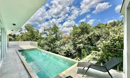 Casa Moderna e Integrada na Granja Viana - A Elegância que Você Merece!