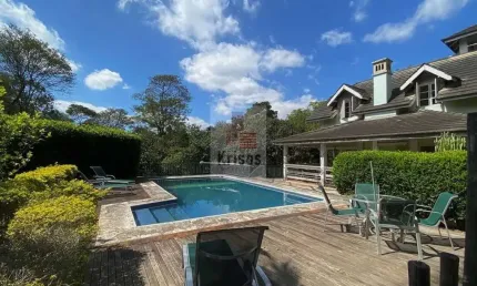 Casa Luxuosa em Estilo Colonial Americano - Assinatura de Sig Bergamin.