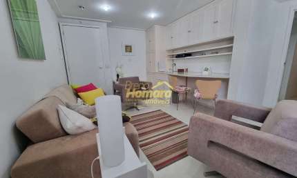 Conjunto Comercial Mobiliado com vaga  , em um excelente Prédio em Movimentada Avenida .