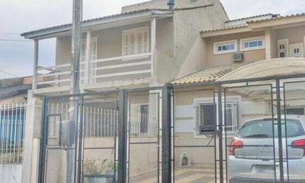 Casa com 3 quartos à venda na Rua Marcelo Küfner, Hípica, Porto Alegre, 144 m2 por R$ 400.000