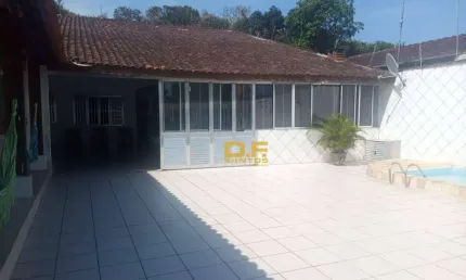 Casa com piscina à venda por R$ 650,000 - Mirim - Praia Grande/SP