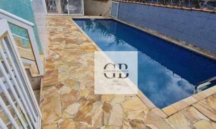 Sobrado com 3 dormitórios à venda, 260 m² por R$ 580.000,00 - Princesa - Praia Grande/SP