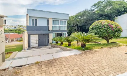 Sobrado com 4 dormitórios à venda, 380 m² por R$ 1.065.000,00 - Villa Lucchesi - Gravataí/RS
