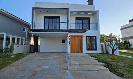 Sobrado com 4 dormitórios à venda, 287 m² por R$ 2.553.000,00 - Alphaville - Gravataí/RS
