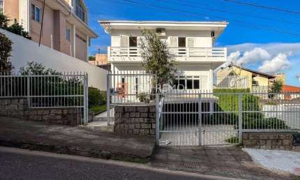 Casa com 4 quartos para alugar na Rua Papa João XXIII, 262, Coqueiros, Florianópolis, 320 m2 por R$ 10.000