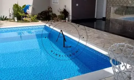 Exclusiva Casa de Luxo em Bolsão de Segurança com Piscina e 6 Suítes - 540m² de Sofisticação