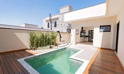 Linda Casa em Condomínio com 3 Suítes, Piscina e Espaço Gourmet
