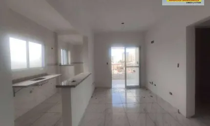 Apartamento com 2 dormitórios à venda, 62 m² por R$ 425.000,00 - Vila Guilhermina - Praia Grande/SP