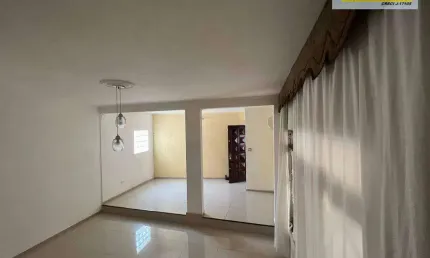 Sobrado com 3 dormitórios à venda, 128 m² por R$ 480.000,00 - Vila Voturuá - São Vicente/SP