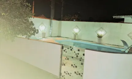 Casa em penha com piscina. permuta por casa em pomerode.