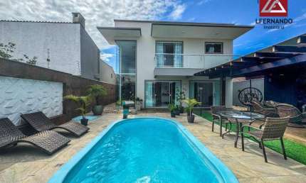 Casa com 3 dormitórios para alugar, 420 m² - Centro - Balneário Piçarras/SC