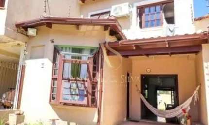 Casa em condomínio fechado com 3 quartos para alugar na Rua Baldoino Bottini, 76, Aberta dos Morros, Porto Alegre por R$ 3.570