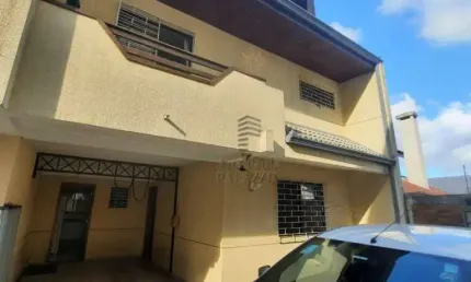 Sobrado com 3 dormitórios à venda, 168 m² por R$ 670.000,00 - Uberaba - Curitiba/PR