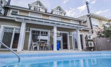 CASA EM CONDOMÍNIO, 5 SUITES E 4 VAGAS NO JARDIM BOTÂNICO!