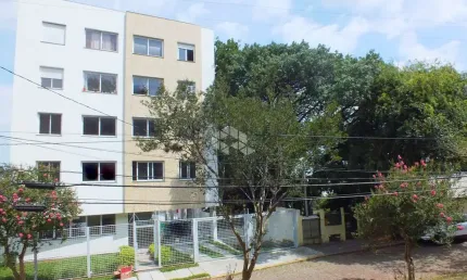 Dois dormitórios com suite duas vagas em frente a praça