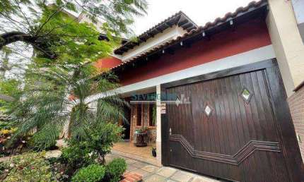 Sobrado com 4 dormitórios à venda, 360 m² por R$ 970.000,00 - Vila Imbui - Cachoeirinha/RS