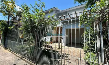 Sobrado com 4 dormitórios à venda, 216 m² por R$ 620.000,00 - Vila Imbui - Cachoeirinha/RS
