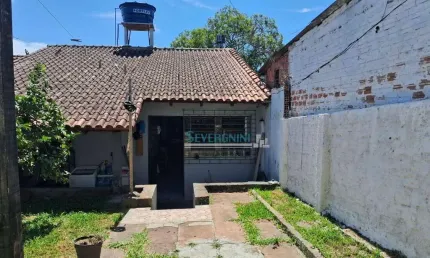 Casa com 3 dormitórios à venda, 133 m² por R$ 517.900,00 - Centro - Gravataí/RS