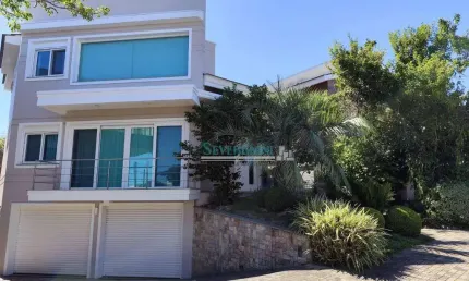 Sobrado com 4 dormitórios à venda, 350 m² por R$ 2.799.000,00 - Alphaville - Gravataí/RS