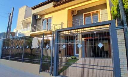 Sobrado com 4 dormitórios à venda, 140 m² por R$ 870.000,00 - Vale do Sol - Cachoeirinha/RS