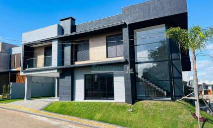 Sobrado com 3 suítes à venda, 180 m² por R$ 1.290.000 - Jansen - Gravataí/RS