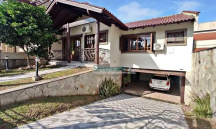 Casa com 3 dormitórios à venda, 200 m² por R$ 850.000,00 - Dom Feliciano - Gravataí/RS