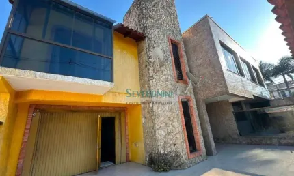 Sobrado com 3 dormitórios à venda, 576 m² por R$ 850.000,00 - Centro - Gravataí/RS