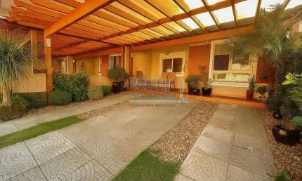 Casa com 3 dormitórios para alugar, 122 m² por r$ 3.500/mês - central park - cachoeirinha/rs