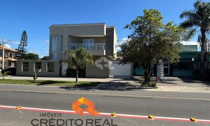 Casa sobrado de alto padrão, com ponto comercial do do lado