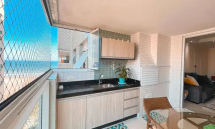 Apartamento à venda em praia grande com 2 quartos, 2 banheiros,prédio frente mar