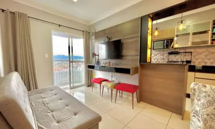 Apartamento à venda em Praia Grande com varanda gourmet e prédio frente mar