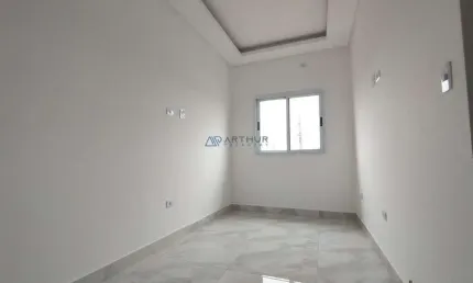 Casa sobreposta Alta à venda no Jardim do Trevo em Praia Grande.