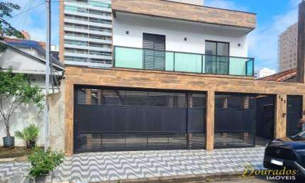 Casa 2 dormitórios com sacada frente rua, condomínio, 66,40 m² - Aviação em Praia Grande/SP