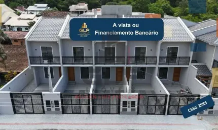 Sobrado geminado a venda na cidade de porto belo/sc, no bairro centro. casa com 157m², 3 suítes e 1vaga de garagem. bem localizado