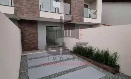 Sobrado geminado a venda na cidade de porto belo/sc, no bairro jardim dourado. com 3 dormitórios sendo 1 suíte e 1 vaga de garagem. a 1.200 m do mar