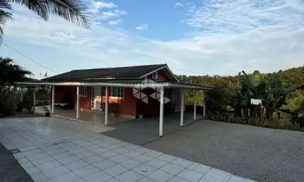 Terreno/sítio com uma casa de alvenaria a venda com 4.945 m²  no bairro são sebastião - palhoça no valor de r$ 795.000,00