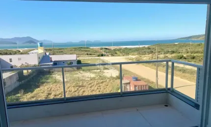 Apartamento a venda na praia da pinheira em palhoça com vista para o mar por 950.000