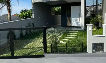 CASA COM 2 DORMITÓRIOS/QUARTOS 1 SENDO SUÍTE EM PALHOÇA-SC, BAIRRO ARIRIU Á VENDA POR R$595,000.00