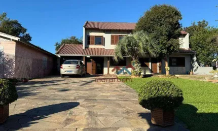 Casa com 4 dormitórios à venda, 250 m² por R$ 936.000,00 - Nossa Senhora das Graças - Canoas/RS