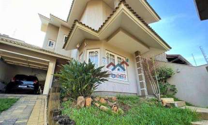 Casa com 3 dormitórios à venda, 175 m² por R$ 1.200.000,00 - Moinhos de Vento - Canoas/RS