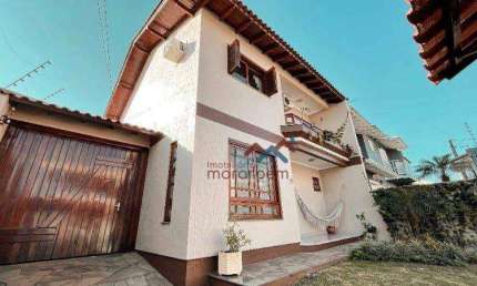 Casa com 3 dormitórios à venda, 190 m² por R$ 900.000,00 - Moinhos de Vento - Canoas/RS