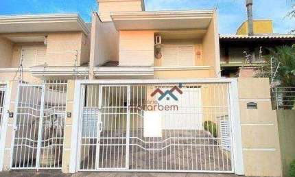 Casa com 3 dormitórios à venda, 190 m² por R$ 980.000,00 - Moinhos de Vento - Canoas/RS
