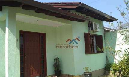 Casa com 3 dormitórios à venda, 140 m² por R$ 480.000,00 - Olaria - Canoas/RS