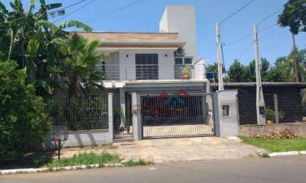 Casa com 5 dormitórios à venda, 227 m² por R$ 950.000,00 - Igara - Canoas/RS