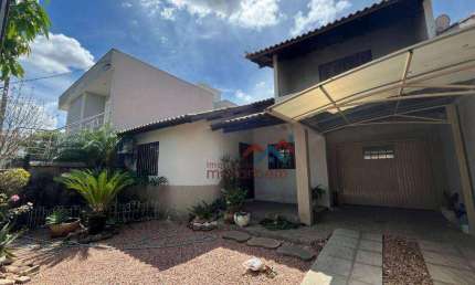 Casa com 2 dormitórios à venda, 120 m² por R$ 649.000,00 - Moinhos de Vento - Canoas/RS