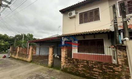 Casa com 2 dormitórios à venda, 80 m² por R$ 320.000 - Olaria - Canoas/RS