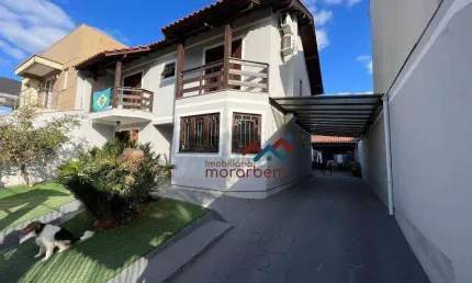 Casa com 3 dormitórios à venda, 190 m² por R$ 1.150.000 - Marechal Rondon - Canoas/RS