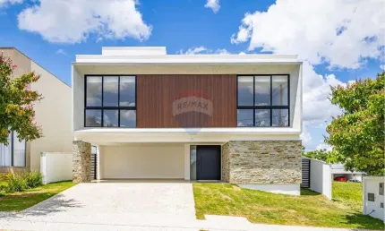 Linda casa com 4 suítes Localizada no Condomínio Alphaville fase 1