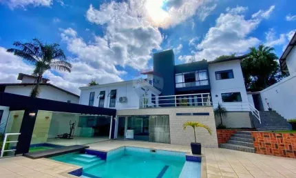 Casa com elevador e 4 quartos no  condomínio parque imperial